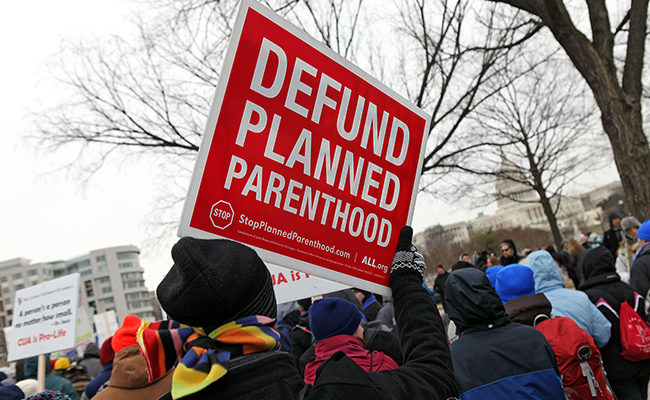 Defund Planned Parenthood sign funding