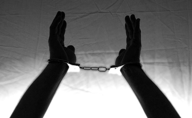 handcuffs prison praise Chinese pastor