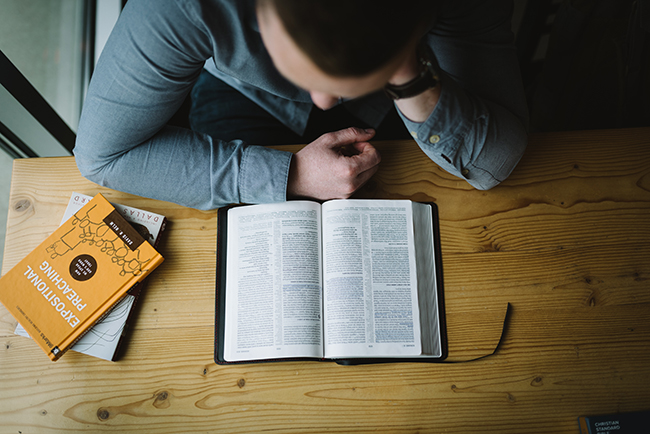 Pastor doing sermon prep - Pastors face different ministry difficulties