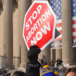 pro-life sign stop abortion now research America Supreme Court