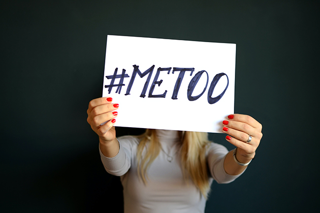 Woman holding "Me Too" sign in front of her face - churches for sexual abuse survivors