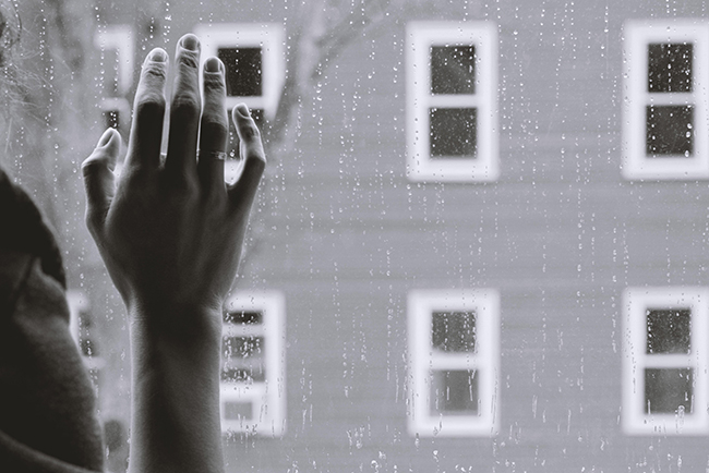 Hand on rainy window - Apathy in church