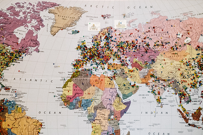 map of the world with pins in it - how to be a sending church