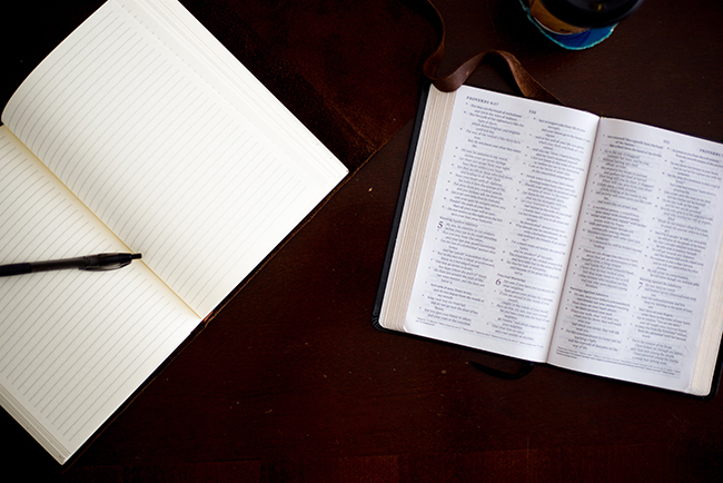Open Bible next to open notebook - teach theology to your church