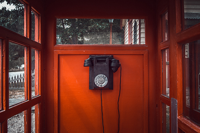 Telephone in phone booth - calling to ministry