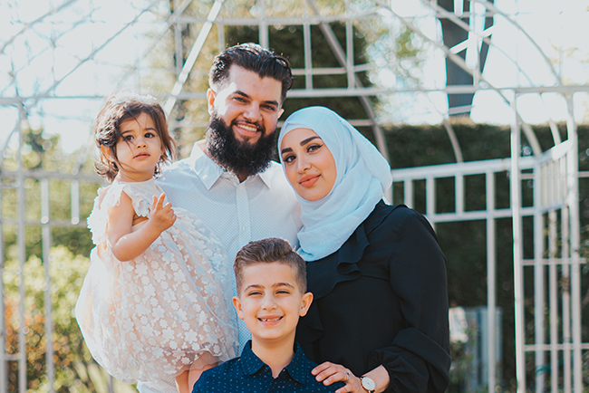 cheerful ethnic family with children - gospel for Muslims