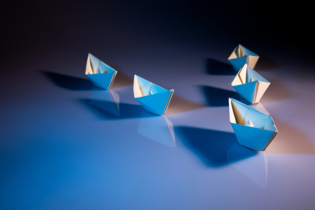 Fleet of paper boats - are you a leader or manager?