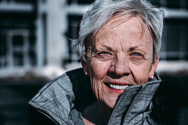 Older woman smiling - groups of women who may be left out of ministry