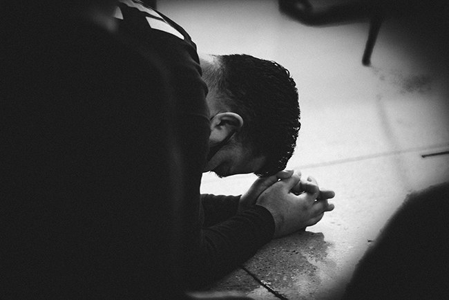 Man on his face in prayer - How does revival start?