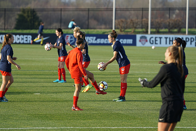 girls warming up for soccer game - travel sports